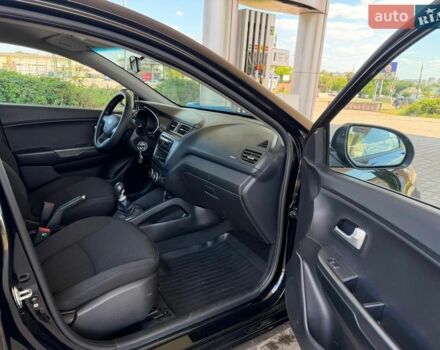 Чорний Кіа Ріо, об'ємом двигуна 1.4 л та пробігом 65 тис. км за 8300 $, фото 2 на Automoto.ua