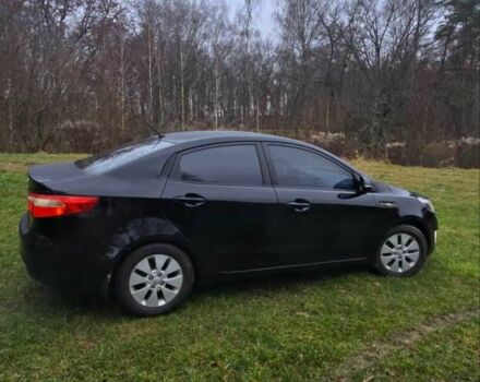 Черный Киа Рио, объемом двигателя 1.6 л и пробегом 231 тыс. км за 5850 $, фото 2 на Automoto.ua