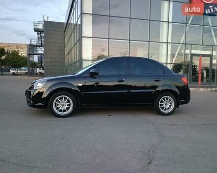 Черный Киа Рио, объемом двигателя 1.4 л и пробегом 150 тыс. км за 4500 $, фото 1 на Automoto.ua