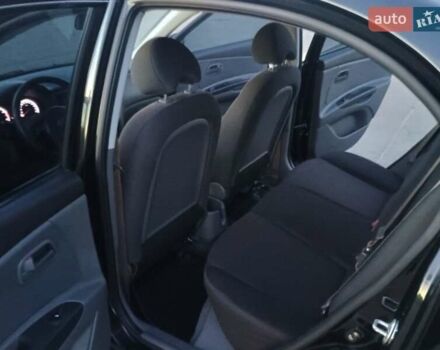 Черный Киа Рио, объемом двигателя 1.4 л и пробегом 150 тыс. км за 4500 $, фото 6 на Automoto.ua