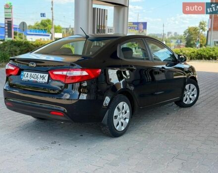 Чорний Кіа Ріо, об'ємом двигуна 1.4 л та пробігом 65 тис. км за 8300 $, фото 5 на Automoto.ua