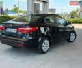 Чорний Кіа Ріо, об'ємом двигуна 1.4 л та пробігом 65 тис. км за 8300 $, фото 5 на Automoto.ua