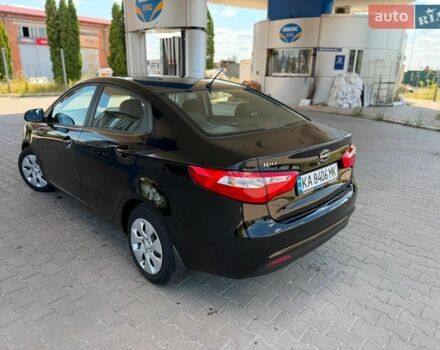 Чорний Кіа Ріо, об'ємом двигуна 1.4 л та пробігом 65 тис. км за 8300 $, фото 1 на Automoto.ua
