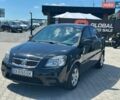 Чорний Кіа Ріо, об'ємом двигуна 1.4 л та пробігом 50 тис. км за 4899 $, фото 1 на Automoto.ua