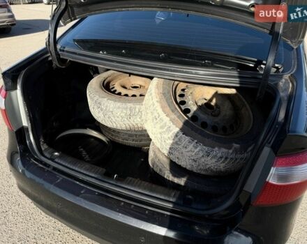 Черный Киа Рио, объемом двигателя 1.4 л и пробегом 162 тыс. км за 7700 $, фото 25 на Automoto.ua