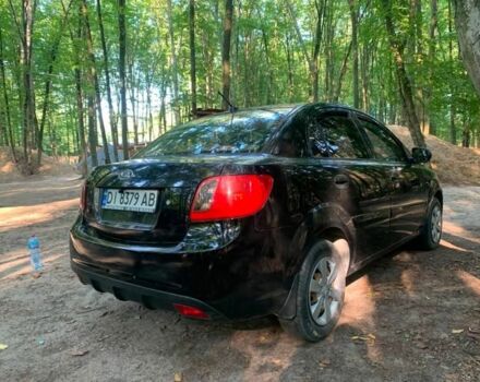 Черный Киа Рио, объемом двигателя 1.4 л и пробегом 270 тыс. км за 4499 $, фото 5 на Automoto.ua