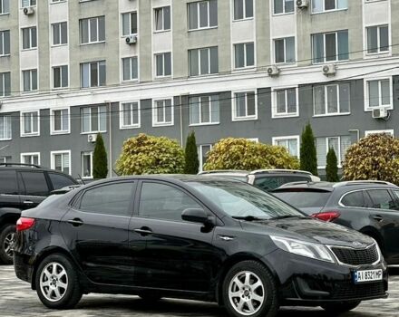 Черный Киа Рио, объемом двигателя 1.4 л и пробегом 180 тыс. км за 5900 $, фото 7 на Automoto.ua