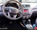 Чорний Кіа Ріо, об'ємом двигуна 1.6 л та пробігом 173 тис. км за 5800 $, фото 2 на Automoto.ua