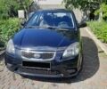 Чорний Кіа Ріо, об'ємом двигуна 1.4 л та пробігом 140 тис. км за 5200 $, фото 2 на Automoto.ua