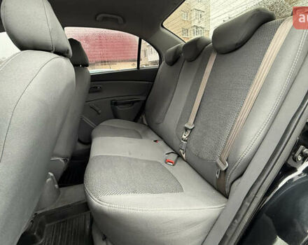 Черный Киа Рио, объемом двигателя 1.4 л и пробегом 100 тыс. км за 5000 $, фото 19 на Automoto.ua