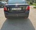 Чорний Кіа Ріо, об'ємом двигуна 1.4 л та пробігом 244 тис. км за 4700 $, фото 1 на Automoto.ua
