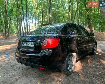 Чорний Кіа Ріо, об'ємом двигуна 1.4 л та пробігом 275 тис. км за 4700 $, фото 4 на Automoto.ua