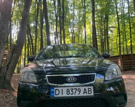 Черный Киа Рио, объемом двигателя 1.4 л и пробегом 270 тыс. км за 4499 $, фото 2 на Automoto.ua