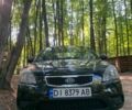 Черный Киа Рио, объемом двигателя 1.4 л и пробегом 270 тыс. км за 4499 $, фото 2 на Automoto.ua