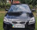 Чорний Кіа Ріо, об'ємом двигуна 1.4 л та пробігом 115 тис. км за 5600 $, фото 1 на Automoto.ua