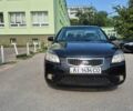Чорний Кіа Ріо, об'ємом двигуна 1.4 л та пробігом 244 тис. км за 4700 $, фото 1 на Automoto.ua