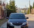 Черный Киа Рио, объемом двигателя 1.4 л и пробегом 180 тыс. км за 6500 $, фото 2 на Automoto.ua