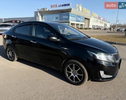Черный Киа Рио, объемом двигателя 1.4 л и пробегом 162 тыс. км за 7700 $, фото 14 на Automoto.ua