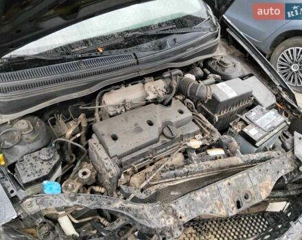 Чорний Кіа Ріо, об'ємом двигуна 1.4 л та пробігом 160 тис. км за 2600 $, фото 7 на Automoto.ua