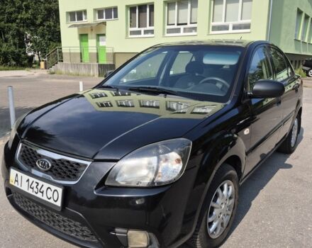 Чорний Кіа Ріо, об'ємом двигуна 1.4 л та пробігом 244 тис. км за 4718 $, фото 5 на Automoto.ua