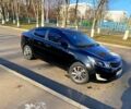 Черный Киа Рио, объемом двигателя 1.4 л и пробегом 135 тыс. км за 7100 $, фото 1 на Automoto.ua