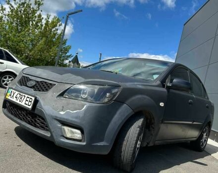 Черный Киа Рио, объемом двигателя 1.4 л и пробегом 169 тыс. км за 3650 $, фото 1 на Automoto.ua