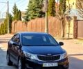 Чорний Кіа Ріо, об'ємом двигуна 1.4 л та пробігом 180 тис. км за 6500 $, фото 1 на Automoto.ua