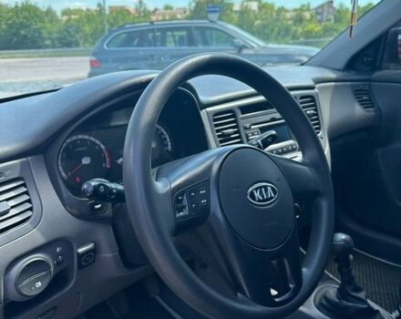 Чорний Кіа Ріо, об'ємом двигуна 1.4 л та пробігом 50 тис. км за 4899 $, фото 7 на Automoto.ua