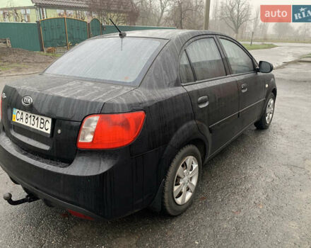 Черный Киа Рио, объемом двигателя 1.4 л и пробегом 105 тыс. км за 4100 $, фото 3 на Automoto.ua
