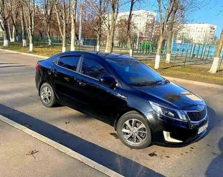 Черный Киа Рио, объемом двигателя 1.4 л и пробегом 1 тыс. км за 7100 $, фото 1 на Automoto.ua