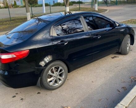 Черный Киа Рио, объемом двигателя 1.4 л и пробегом 135 тыс. км за 6700 $, фото 4 на Automoto.ua