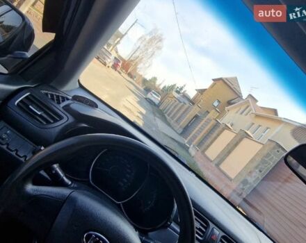Чорний Кіа Ріо, об'ємом двигуна 1.4 л та пробігом 180 тис. км за 6450 $, фото 1 на Automoto.ua
