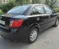 Чорний Кіа Ріо, об'ємом двигуна 1.4 л та пробігом 244 тис. км за 4718 $, фото 2 на Automoto.ua