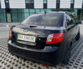 Чорний Кіа Ріо, об'ємом двигуна 1.4 л та пробігом 208 тис. км за 3900 $, фото 6 на Automoto.ua