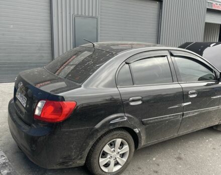 Черный Киа Рио, объемом двигателя 1.4 л и пробегом 150 тыс. км за 1800 $, фото 1 на Automoto.ua