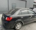 Черный Киа Рио, объемом двигателя 1.4 л и пробегом 150 тыс. км за 1800 $, фото 1 на Automoto.ua