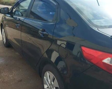 Чорний Кіа Ріо, об'ємом двигуна 1.6 л та пробігом 150 тис. км за 8000 $, фото 3 на Automoto.ua