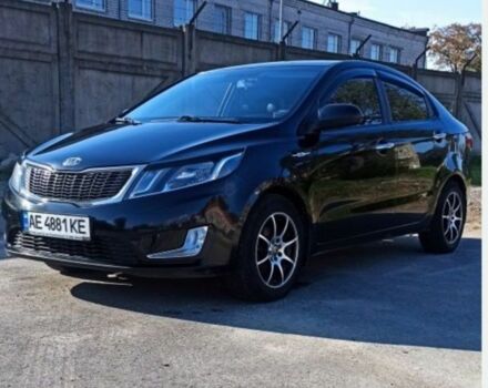 Чорний Кіа Ріо, об'ємом двигуна 1.4 л та пробігом 160 тис. км за 6900 $, фото 2 на Automoto.ua