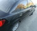 Черный Киа Рио, объемом двигателя 1.4 л и пробегом 160 тыс. км за 2608 $, фото 6 на Automoto.ua