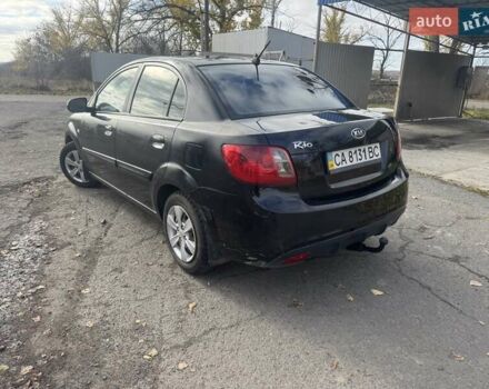 Чорний Кіа Ріо, об'ємом двигуна 1.4 л та пробігом 105 тис. км за 4400 $, фото 2 на Automoto.ua
