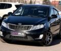 Черный Киа Рио, объемом двигателя 1.4 л и пробегом 162 тыс. км за 7700 $, фото 1 на Automoto.ua