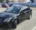Черный Киа Рио, объемом двигателя 1.4 л и пробегом 224 тыс. км за 4600 $, фото 1 на Automoto.ua