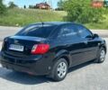 Чорний Кіа Ріо, об'ємом двигуна 1.4 л та пробігом 50 тис. км за 4899 $, фото 4 на Automoto.ua