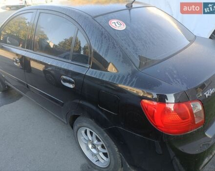 Черный Киа Рио, объемом двигателя 1.4 л и пробегом 160 тыс. км за 2600 $, фото 2 на Automoto.ua
