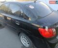 Черный Киа Рио, объемом двигателя 1.4 л и пробегом 160 тыс. км за 2600 $, фото 2 на Automoto.ua