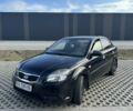 Черный Киа Рио, объемом двигателя 1.4 л и пробегом 206 тыс. км за 4999 $, фото 1 на Automoto.ua