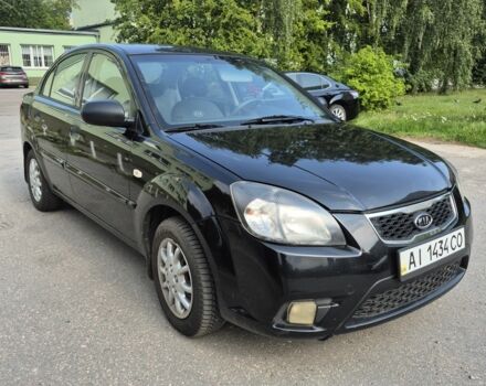 Чорний Кіа Ріо, об'ємом двигуна 1.4 л та пробігом 244 тис. км за 4718 $, фото 1 на Automoto.ua