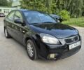 Чорний Кіа Ріо, об'ємом двигуна 1.4 л та пробігом 244 тис. км за 4718 $, фото 1 на Automoto.ua