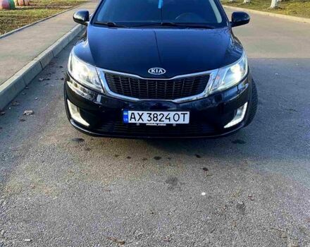 Чорний Кіа Ріо, об'ємом двигуна 1.4 л та пробігом 1350 тис. км за 7100 $, фото 3 на Automoto.ua