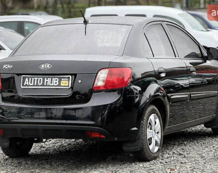 Черный Киа Рио, объемом двигателя 1.4 л и пробегом 100 тыс. км за 5000 $, фото 11 на Automoto.ua